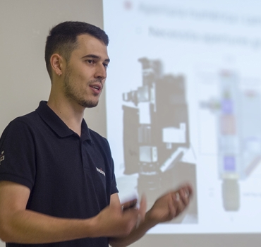 Optical system for the measurement of the surface topography of additively manufactured parts